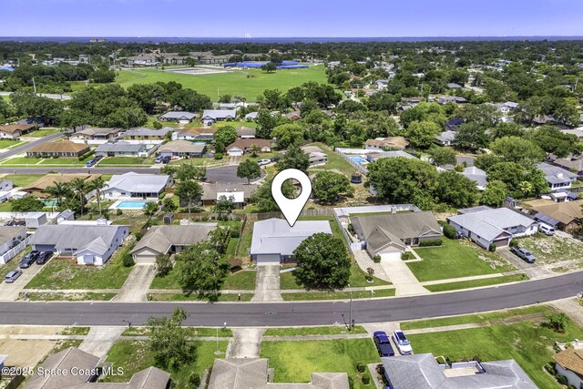 3845 Spring Creek Ln, Titusville, FL 32780 - aerial overview of property's location featuring nearby suburban area