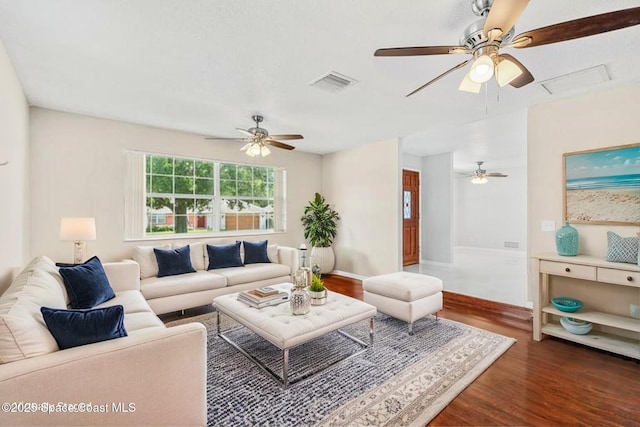 3845 Spring Creek Ln, Titusville, FL 32780 - living room with a ceiling fan, attic access, and wood finished floors