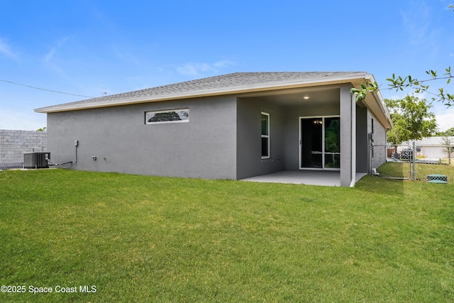1610 Yahner St SE, Palm Bay, FL 32909 - rear view of house featuring a patio area, stucco siding, and central air condition unit