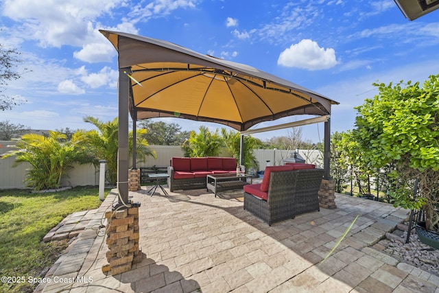 3847 Loggerhead Ln, Mims, FL 32754 - view of patio / terrace featuring outdoor lounge area, a gazebo, and a fenced backyard