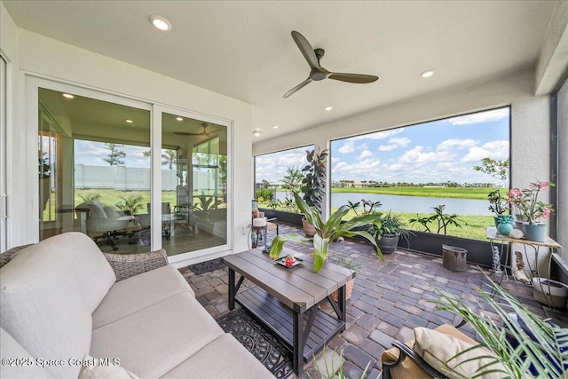 2902 Tidepool Pl, Melbourne, FL 32940 - sunroom / solarium featuring a water view, ceiling fan, and an outdoor living space