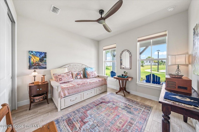 2902 Tidepool Pl, Melbourne, FL 32940 - bedroom featuring light wood-style flooring, baseboards, and ceiling fan