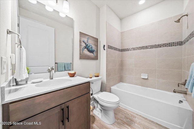 2902 Tidepool Pl, Melbourne, FL 32940 - bathroom with wood finished floors, toilet, bathing tub / shower combination, and vanity