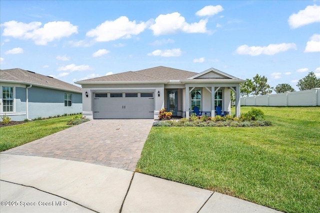 2902 Tidepool Pl, Melbourne, FL 32940 - ranch-style home with decorative driveway, an attached garage, and stucco siding