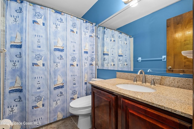 1170 Faulkingham Rd, Merritt Island, FL 32952 - bathroom featuring toilet, tile patterned flooring, and vanity