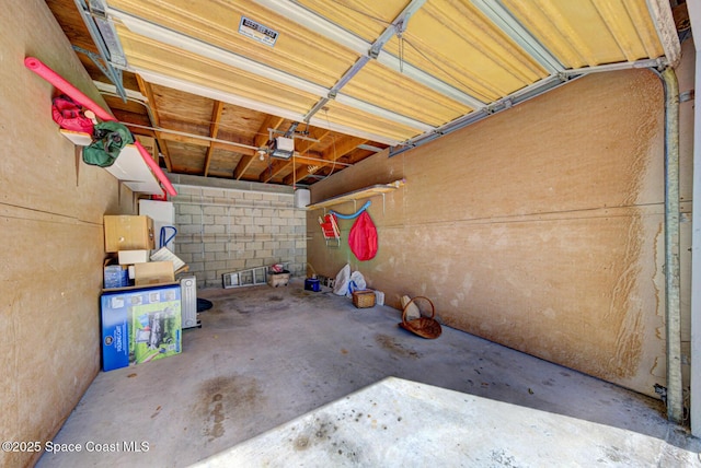 garage featuring a garage door opener