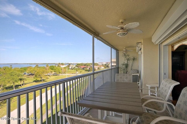 732 Bayside Dr Unit 501, Cape Canaveral, FL 32920 - balcony featuring a ceiling fan and a water view