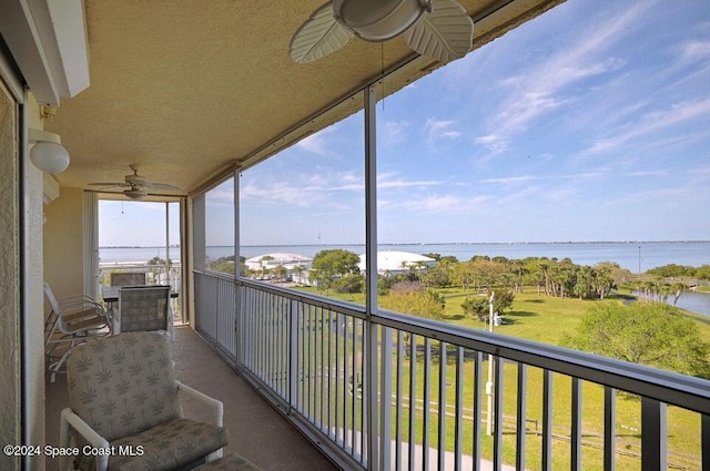 732 Bayside Dr Unit 501, Cape Canaveral, FL 32920 - balcony with a water view and ceiling fan