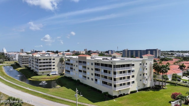 732 Bayside Dr Unit 501, Cape Canaveral, FL 32920 - view of apartment building / complex featuring a water view and a city view