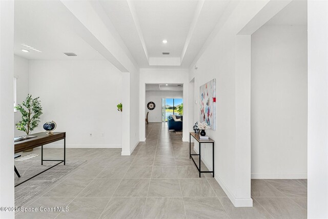 1342 Great Belt Cir, Melbourne, FL 32940 - hallway featuring recessed lighting, baseboards, and light tile patterned floors