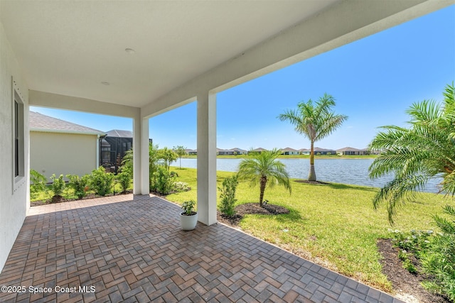 1342 Great Belt Cir, Melbourne, FL 32940 - view of patio / terrace with a water view and a residential view