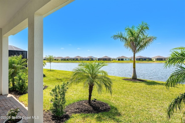 1342 Great Belt Cir, Melbourne, FL 32940 - view of green lawn with a residential view and a water view