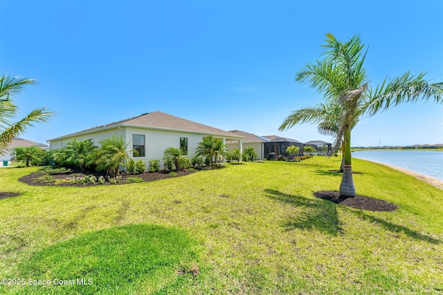 1342 Great Belt Cir, Melbourne, FL 32940 - view of green lawn featuring a water view