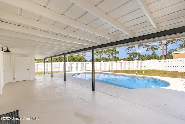 view of swimming pool with a patio area and a fenced backyard