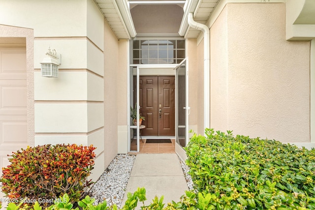 4882 Worthington Cir, Rockledge, FL 32955 - doorway to property featuring stucco siding