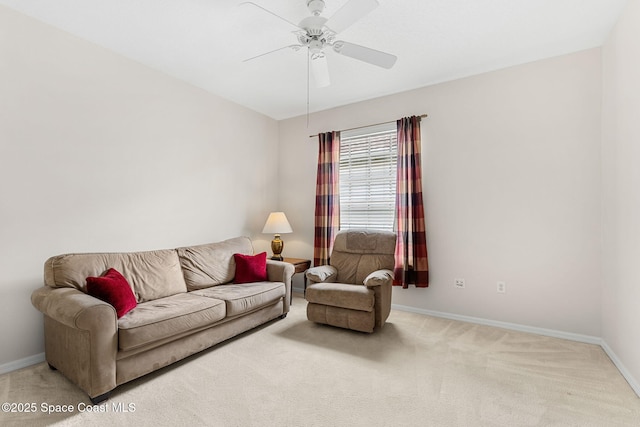 4882 Worthington Cir, Rockledge, FL 32955 - carpeted living area featuring a ceiling fan and baseboards