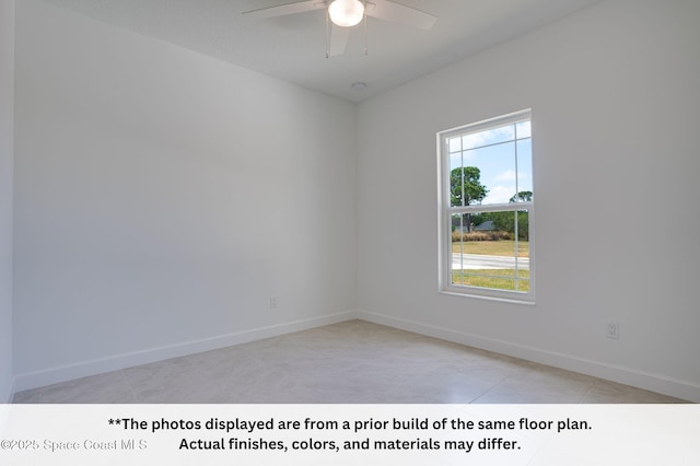 125 Admiral Cir, Sebastian, FL 32958 - empty room featuring ceiling fan, light tile patterned flooring, and baseboards