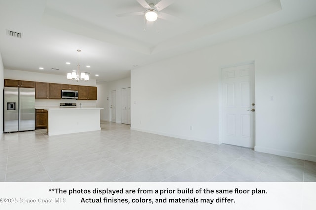 125 Admiral Cir, Sebastian, FL 32958 - unfurnished living room featuring a chandelier, recessed lighting, a ceiling fan, baseboards, and light tile patterned floors