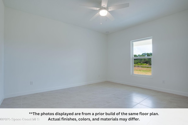 125 Admiral Cir, Sebastian, FL 32958 - unfurnished room featuring light tile patterned floors, baseboards, and a ceiling fan