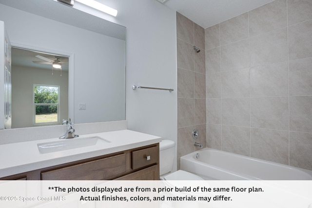 125 Admiral Cir, Sebastian, FL 32958 - full bathroom featuring vanity, toilet, shower / bathtub combination, and ceiling fan