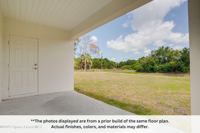 125 Admiral Cir, Sebastian, FL 32958 - view of grassy yard with a patio area