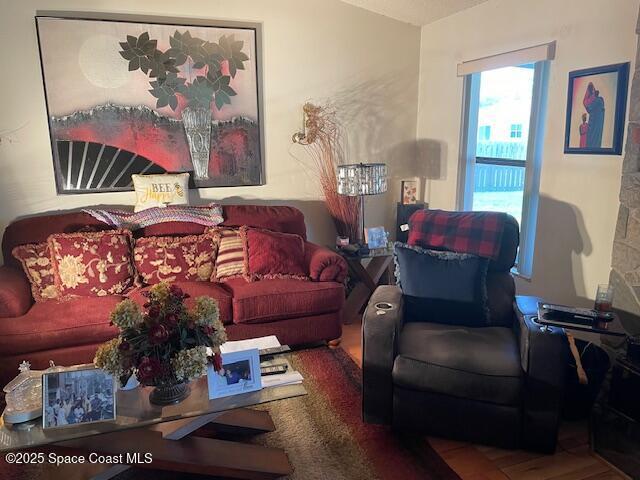 living area featuring vaulted ceiling
