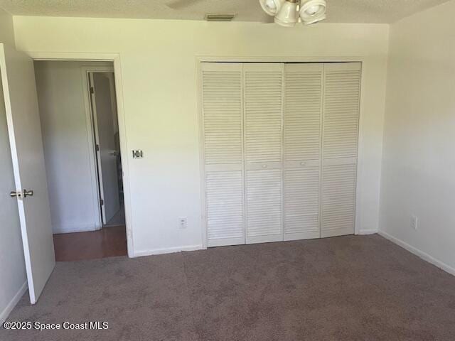 1551 Hardwicke St NW, Palm Bay, FL 32907 - unfurnished bedroom with carpet floors and a closet
