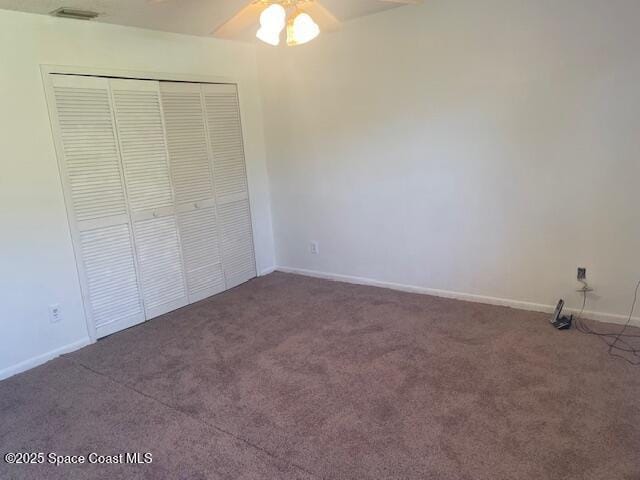 1551 Hardwicke St NW, Palm Bay, FL 32907 - unfurnished bedroom featuring carpet flooring, a closet, and ceiling fan