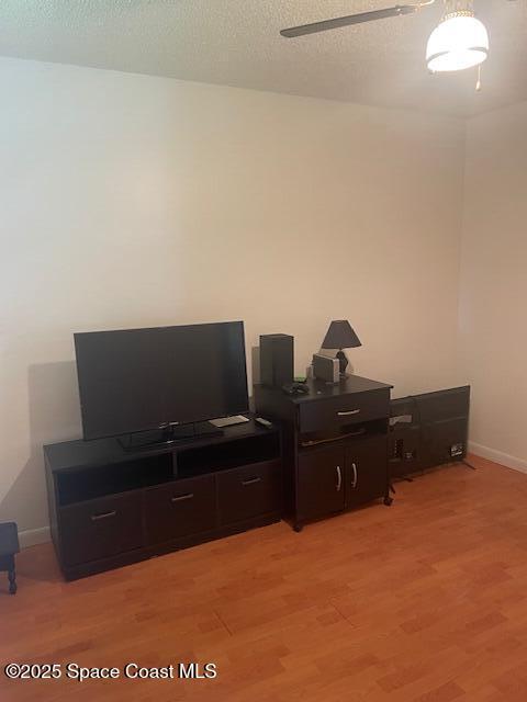 1551 Hardwicke St NW, Palm Bay, FL 32907 - office with light wood finished floors and ceiling fan