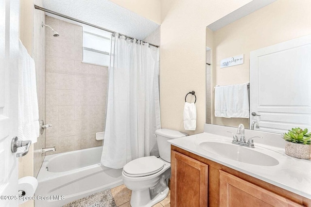 bathroom featuring toilet, shower / bath combination with curtain, vanity, and tile patterned floors