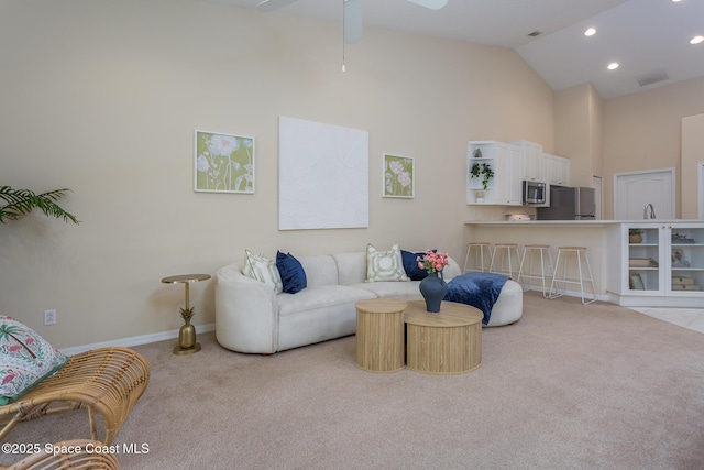 living room with carpet floors, high vaulted ceiling, baseboards, recessed lighting, and a ceiling fan