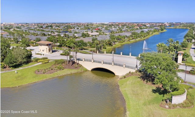 aerial perspective of suburban area featuring a nearby body of water