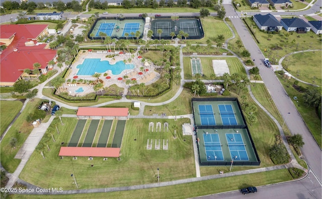 view of property location with a pool area