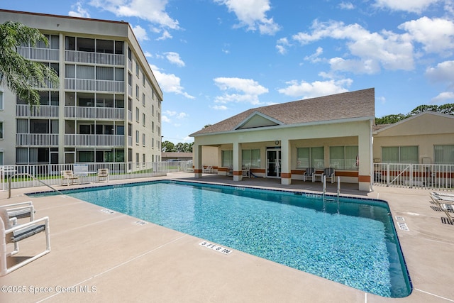 1420 Huntington Ln Unit 2402, Rockledge, FL 32955 - community pool with a patio and an outdoor structure