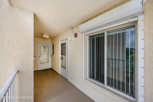 1420 Huntington Ln Unit 2402, Rockledge, FL 32955 - doorway to property featuring stucco siding
