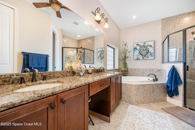 679 Sheridan Woods Dr, Melbourne, FL 32904 - bathroom featuring a shower stall, a garden tub, double vanity, ceiling fan, and tile patterned floors