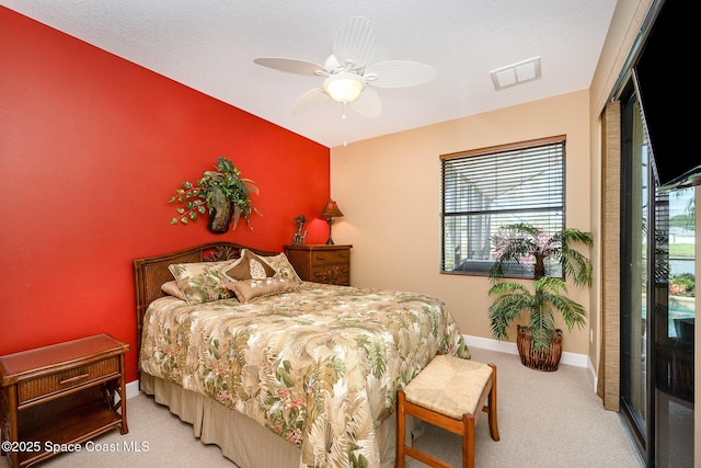 679 Sheridan Woods Dr, Melbourne, FL 32904 - carpeted bedroom with baseboards and a ceiling fan