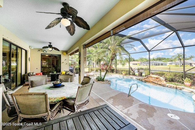 679 Sheridan Woods Dr, Melbourne, FL 32904 - view of patio with ceiling fan, an outdoor pool, outdoor dining area, and a lanai