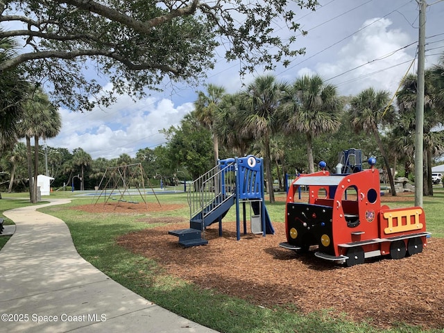 communal playground with a lawn
