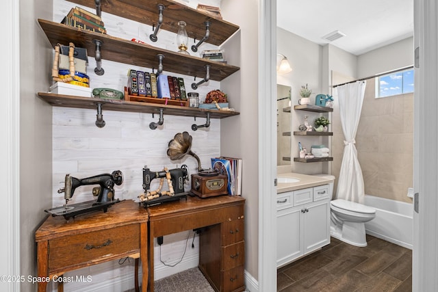 3631 Stabane Pl, Melbourne, FL 32940 - bathroom featuring shower / bath combo, toilet, vanity, and wood finished floors