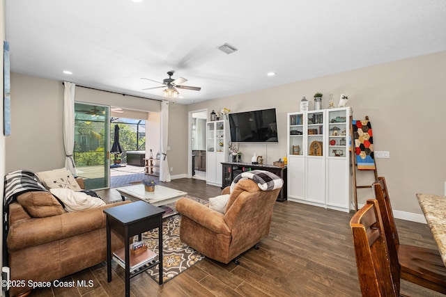 3631 Stabane Pl, Melbourne, FL 32940 - living area with dark wood-style flooring, a ceiling fan, baseboards, and recessed lighting