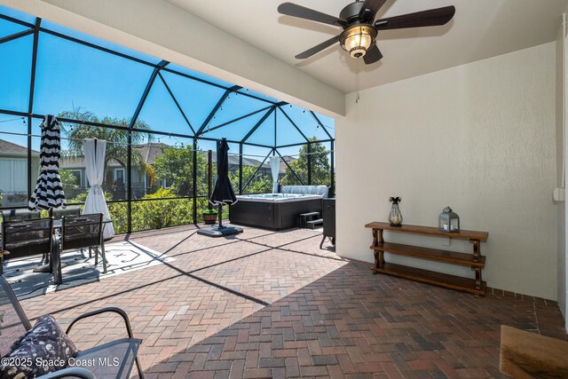 3631 Stabane Pl, Melbourne, FL 32940 - view of patio / terrace with a hot tub, a lanai, ceiling fan, and outdoor dining area