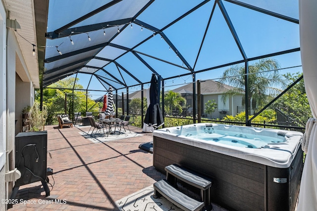 3631 Stabane Pl, Melbourne, FL 32940 - view of patio with a hot tub, outdoor dining area, and a lanai