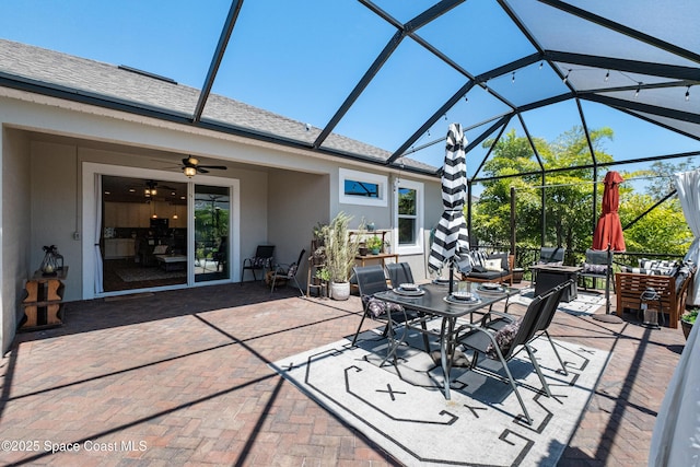 3631 Stabane Pl, Melbourne, FL 32940 - view of patio featuring glass enclosure, outdoor dining space, and ceiling fan