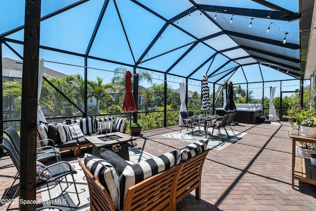 3631 Stabane Pl, Melbourne, FL 32940 - view of patio featuring a hot tub, an outdoor living space with a fire pit, and a lanai