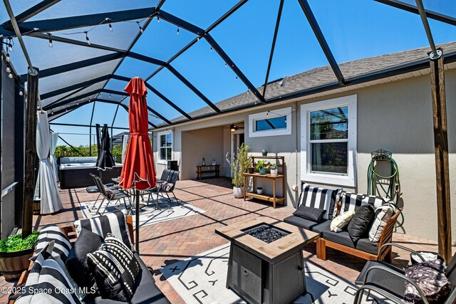 3631 Stabane Pl, Melbourne, FL 32940 - view of patio with a hot tub, glass enclosure, an outdoor living space with a fire pit, and ceiling fan