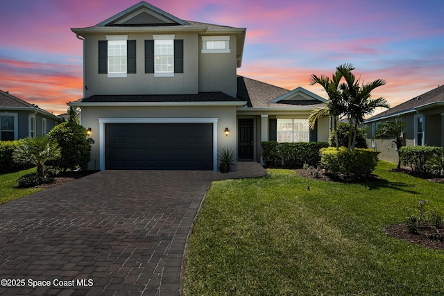 3631 Stabane Pl, Melbourne, FL 32940 - traditional home featuring stucco siding, driveway, an attached garage, and a yard
