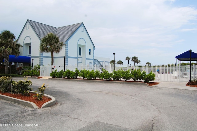 view of building exterior featuring fence