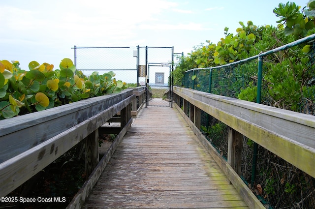 dock area with fence and a gate