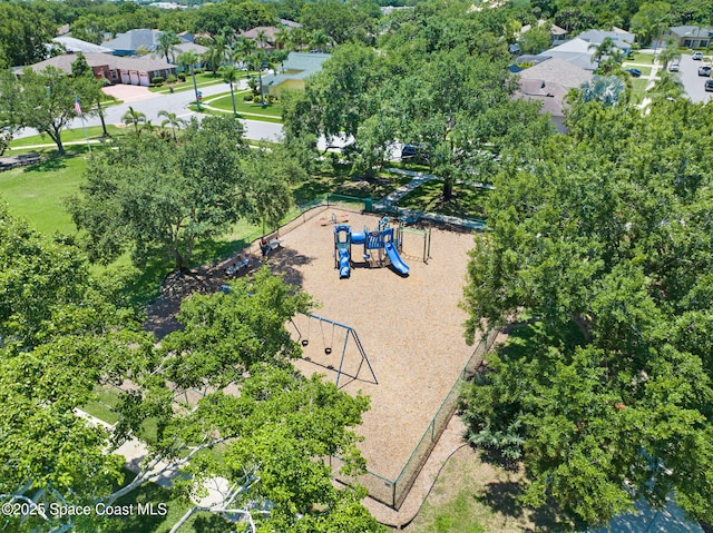178 Cove Loop Dr, Merritt Island, FL 32953 - aerial view of property and surrounding area with nearby suburban area and a tree filled landscape